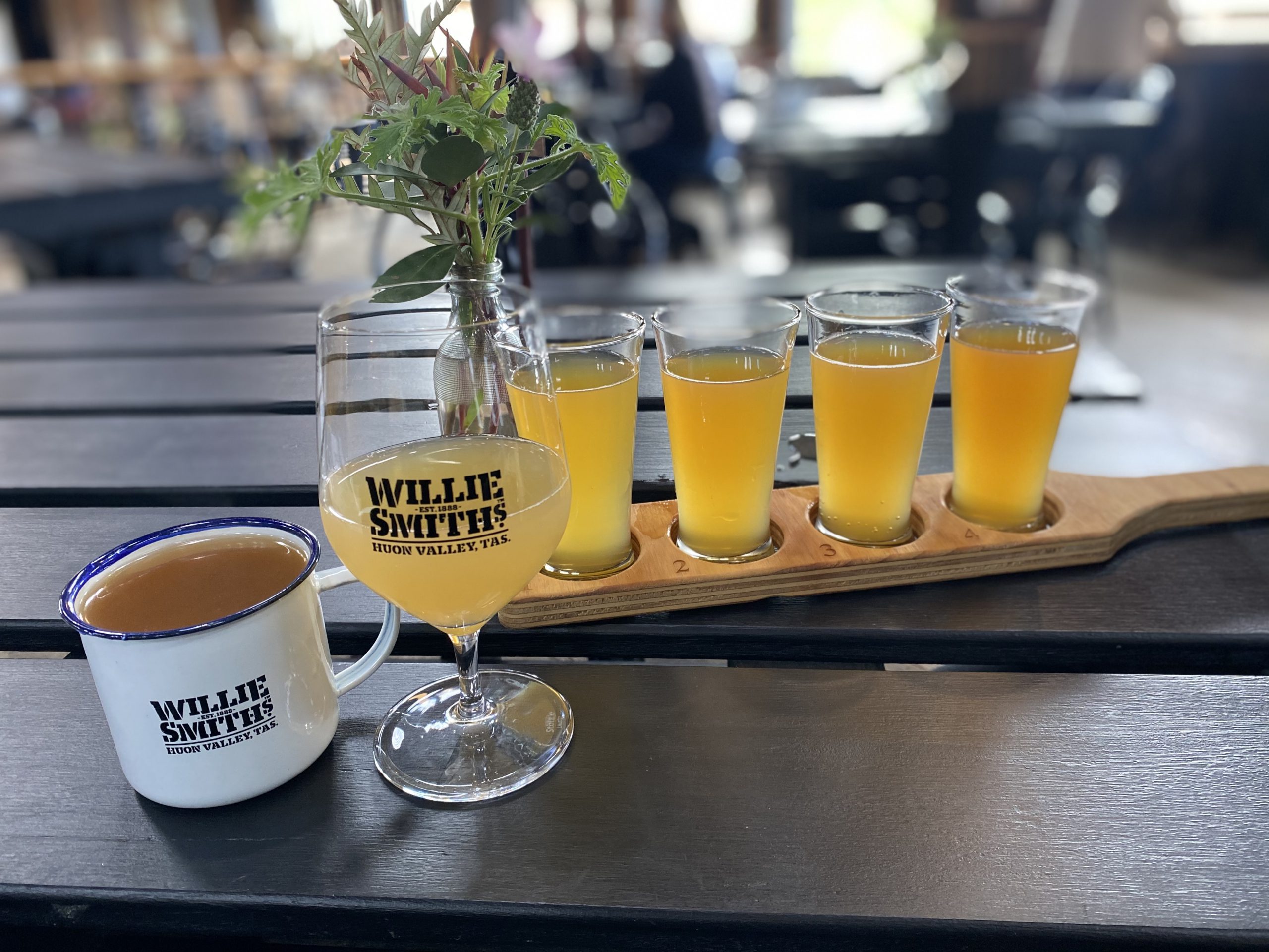 A tasting paddle along with mulled apple cider and pear cider at Willie Smith's Apple Shed
