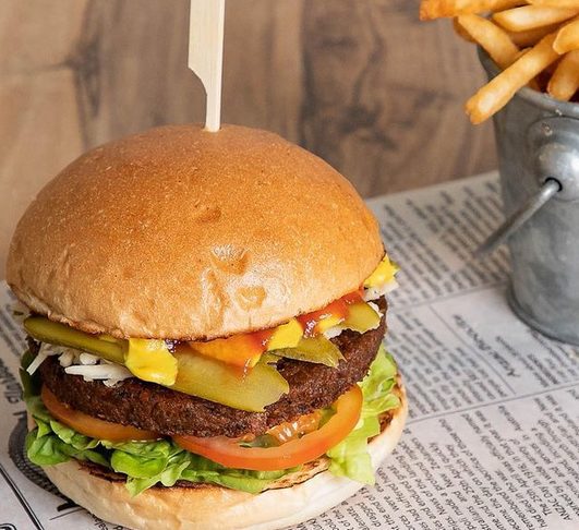 Plant-based burger and fries via Suburban